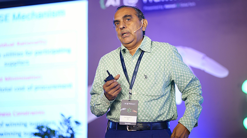 Y. Narahari, Professor, Indian Institute of Science (IISc) delivering a talk on stage. 