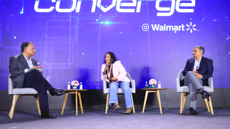 Panel discussion on stage at Converge @ Walmart between Mrinal Chatterjee, VP, Engineering, Walmart Global Tech; Ravikiran Annaswamy, CEO and Co-founder, Numocity and Dr. Fathima Benazir J, Co-founder and Chief Scientific Officer, Azooka Labs.