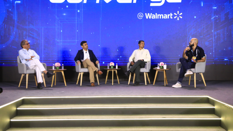 Panel discussion on stage at Converge @ Walmart between Raghavan Balakrishnan, VP, Engineering, Walmart Global Tech; Chaitanya Ramalingegowda, Co-founder, Wakefit; Ramneek Khurana, Co-founder, Lenskart and Manohar Swaminathan, Sr. Principal Researcher, Microsoft Research India.