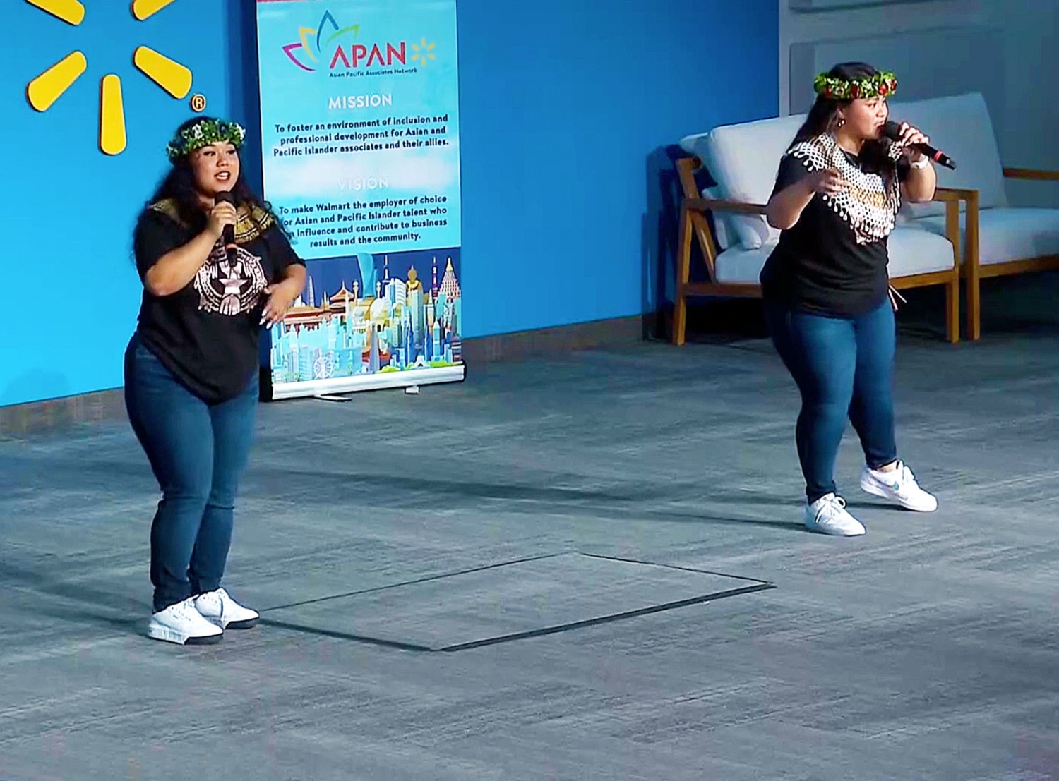 Nette and Lie singing at the Walmart Home Office auditorium